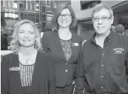  ??  ?? Penny Sopel of Peninsula Co-op, left, Catherine Holt of the Victoria Chamber of Commerce and Mike Black of Capital Iron at the Think Local First AGM.