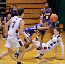  ?? PILOT PHOTO/BEV HARAMIA ?? Jake Taylor draws the charge during Glenn’s NIC win Tuesday night.