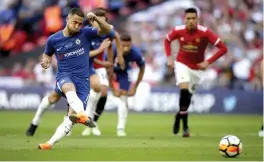  ?? — AP ?? Chelsea’s Eden Hazard scores against Manchester United in their FA Cup final on Saturday. Chelsea won 1- 0.