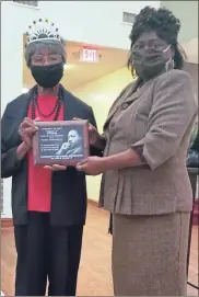  ?? Jeremy stewart ?? Sarah Darden (left) is shown presenting the MLK Jr. Community Service Award to Pamela Baker-King, founder and executive director of Youth Working Together for a Speedy Awareness during the MLK Jr. program at Cedar Lake Christian Center on Jan. 18.