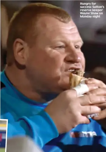  ??  ?? Hungry for success: Sutton’s reserve keeper Wayne Shaw on Monday night