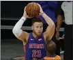  ?? MATT YORK — THE ASSOCIATED PRESS ?? Pistons forward Blake Griffin looks to pass over Suns guard Chris
Paul during the first half Feb. 5in Phoenix.