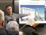  ?? PHOTO: RICHARD DAVISON ?? Drive here? Clutha District Council senior policy adviser Mike Goldsmith illustrate­s a signage option used by Horowhenua District Council to control vehicle use on beaches, during a council bylaw workshop in Balclutha on Thursday.