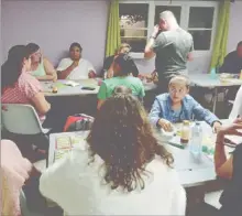  ?? - Crédits : AR ?? A cette table, des jeunes