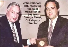  ??  ?? John Clibborn, left, receiving the Seal medallion in 1995 from George Tenet, CIA deputy director