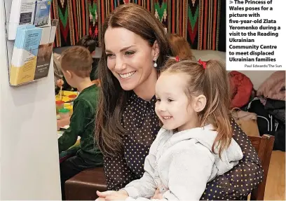  ?? Paul Edwards/The Sun ?? The Princess of Wales poses for a picture with five-year-old Zlata Yeromenko during a visit to the Reading Ukrainian Community Centre to meet displaced Ukrainian families