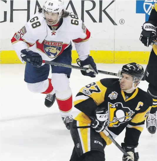  ?? — THE ASSOCIATED PRESS ?? Jaromir Jagr and Sidney Crosby were in the spotlight for different reasons during Sunday’s game in Pittsburgh. The Pens aired a video tribute to their former superstar before their current superstar scored three goals in a 4-0 win.