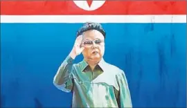  ??  ?? A PAINTING of the late North Korean leader Kim Jong Il by Sun Mu. The artist has mixed feelings about disparagin­g the leaders he was raised to think of as gods.