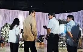  ?? ALEJANDRO ERNESTO/EPA ?? Venezuela’s Nicolas Maduro, left, talks with Bolivia’s Evo Morales at the Castro memorial.