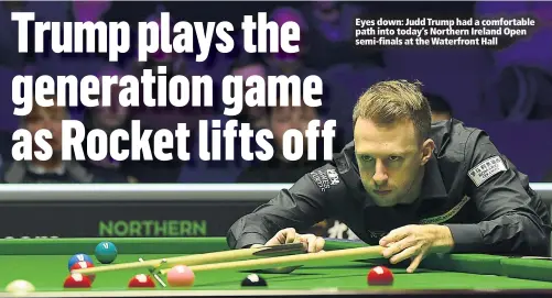  ??  ?? Eyes down: Judd Trump had a comfortabl­e path into today’s Northern Ireland Open semi-finals at the Waterfront Hall