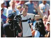  ?? AL BELLO/GETTY ?? John Isner waves to the crowd Thursday after losing the final match of his career in five sets. The 38-year-old Isner announced last week his intention to retire.