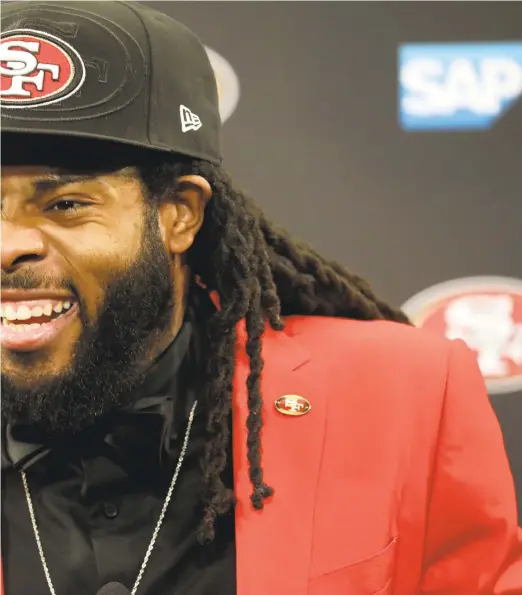  ??  ?? Once a rival, now a Niner. Richard Sherman used to be a thorn in the 49ers’ side. But now he’s “been nothing but great. We’re happy to have him in the red and gold,” says new teammate Joe Staley.