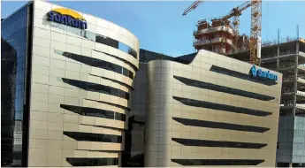  ??  ?? SANTAM and Sanlam headquarte­rs north of Johannesbu­rg. Sanlam said yesterday that it would issue an aggregate of 5 percent of ordinary shares to a new broad-based group of empowermen­t shareholde­rs and UB. SIMPHIWE MBOKAZI African News Agency (ANA)