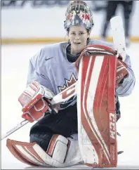  ?? CP PHOTO ?? Team Canada goaltender Charline Labonte takes a break during the team’s practice at the women’s world hockey championsh­ips Saturday, April 2, 2016, in Kamloops, B.C.