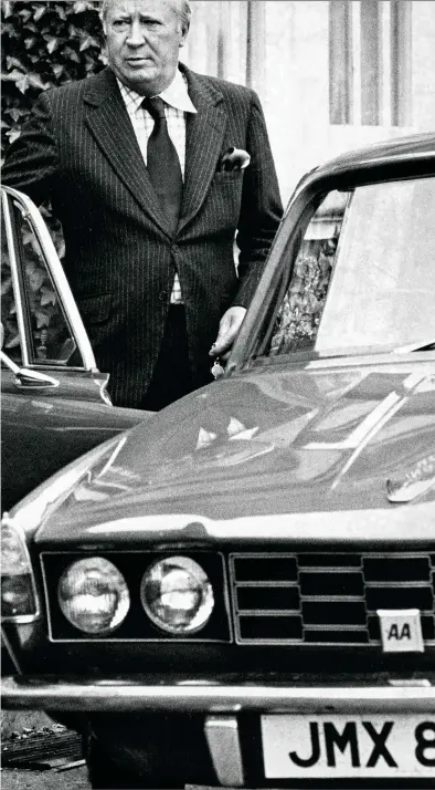  ??  ?? EVIDENCE: This 1975 picture shows Sir Edward getting into the driver’s side of his Rover, keys in hand