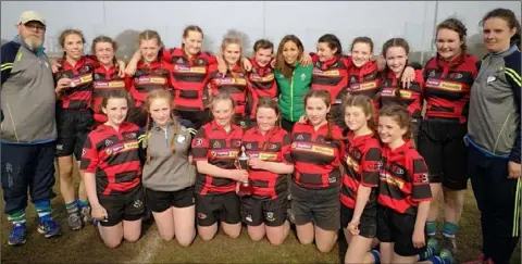  ??  ?? The Argo girls with their coaches after their Under-14 success.