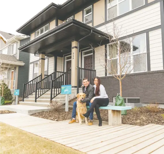  ?? DON MOLYNEAUX ?? “This has been my dream forever, ” says Yadira Ocampo Lisca, with husband Daniel Bejarano Pinilla and dog Milo at Hopewell Residentia­l’s Coho show home in Mahogany.