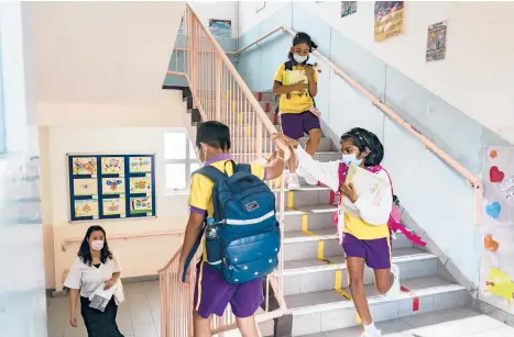  ?? ANTHONY KWAN/THE NEW YORK TIMES ?? Chiu Sheung School students in Hong Kong. The city’s school enrollment is shrinking.