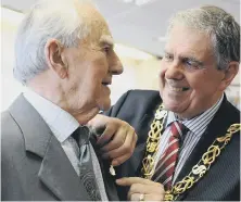  ??  ?? Mr Hepburn was presented with the badge by the then Mayor of Sunderland, Coun Barry Curran.