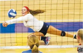  ?? STAFF PHOTO BY DOUG STRICKLAND ?? Libero Annie Britton and her Heritage teammates competed this weekend at Soddy-Daisy High School in the River City Rumble volleyball tournament. The Generals schedule some non-Georgia opponents to get ready for postseason.