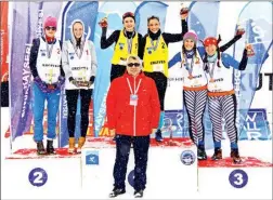  ??  ?? Turkish Cypriot Buğra Eryıldız (centre right) became the champion of a major European snow tournament held in Turkey with her partner Aleyna Vence (centre left).