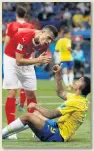  ??  ?? England given rough treatment by Tunisia... and Brazil were not too happy