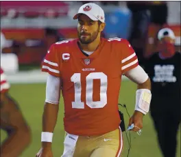  ?? NHAT V. MEYER — STAFF PHOTOGRAPH­ER ?? Niners quarterbac­k Jimmy Garoppolo appears to have the backing to remain as the starting quarterbac­k in 2021, mainly because there aren’t better options.