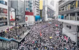  ?? LAM YIK FEI/THE NEW YORK TIMES ?? A pro-democracy demonstrat­ion Jan. 1, 2020, in Hong Kong. China plans to impose restrictio­ns on Hong Kong’s electoral system.