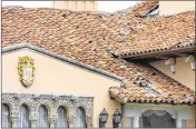  ?? PALM BEACH DAILY NEWS 2005 ?? The Mar-a-Lago Club’s roof was damaged in Hurricane Wilma in 2005. Donald Trump says he received a $17 million insurance payment after the storm.