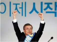  ?? (Kim Hong-ji/Reuters) ?? MOON JAE-IN reacts after winning the nomination as a presidenti­al candidate of the Minjoo Party in Seoul yesterday.