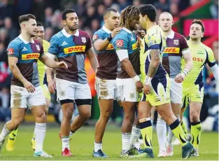  ??  ?? Making friends: Marland Yarde and Denny Solomona clash