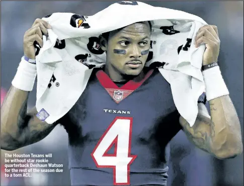  ??  ?? AP The Houston Texans will be without star rookie quarterbac­k Deshaun Watson for the rest of the season due to a torn ACL.