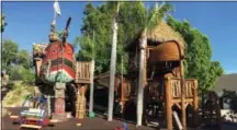  ?? DENISE CASTER VIA AP ?? In this 2017 photo provided by Denise and Brian Caster, two custom playhouses built by Daniels Wood Land sit in the Caster’s yard in San Diego The pirate ship and Swiss Family Robinson-inspired treehouses are built on recycled treestumps and connected...