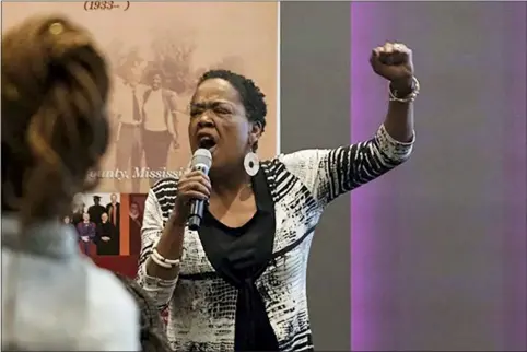  ?? MEREDITH WILLIAMS VIA AP ?? Jaribu Hill speaks at the Mississipp­i Civil Rights Museum in Jackson, Miss., during a reception honoring the life of civil rights activist Unita Blackwell.