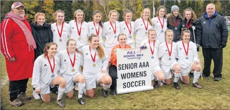  ?? JASON MALLOY/THE GUARDIAN ?? The Charlottet­own Rural Raiders won the Prince Edward Island School Athletic Associatio­n senior AAA girls’ soccer championsh­ip Saturday in Cornwall. Team members, front row, from left are Mia Fradsham, Reese Kelly, Meghan Newson, MaciLynn Ross, Emily Cormier, Mary Cate Dodds and Allison Weatherbie. Second row, coach Chuck Gallison, coach Maddy Dorion, Maddy Neale, Emma Stanley, Emily MacInnis, Jordan MacMonagle, Maddy Cogswell, Jordan Power, Ainsleigh Clark, Sydney Witlock, Hailey Cormier and coach Aaron Jarvis.