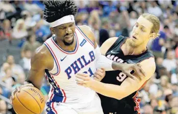  ?? JAMIE SQUIRE/GETTY IMAGES ?? Kelly Olynyk, right, has had to get used to the Heat’s system on defense which is different from what he was part of in Boston.