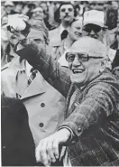  ?? PROVIDED ?? A smiling Halas, 85, throws out the ceremonial first pitch at the Cubs’ home opener in 1980 at Wrigley Field.