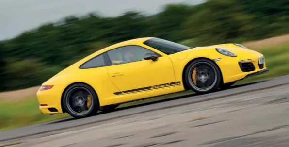  ??  ?? Above The 991 Carrera T was available in Black, White, Guards Red and Racing Yellow