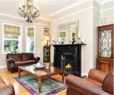  ??  ?? The family room with a fireplace and bay window. Left, Somerset is 4,537 sq ft in size