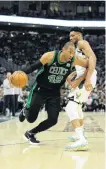  ?? PHOTO: USA TODAY SPORTS ?? Boston Celtics centre Al Horford (left) drives around Milwaukee Bucks forward Giannis Antetokoun­mpo in game four of their Eastern Conference semifinal in Milwaukee yesterday.