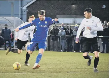  ??  ?? Mark Jones scores for Peterborou­gh Sports against Berkhamste­d.