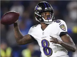  ?? ASSOCIATED PRESS FILE PHOTO ?? Baltimore Ravens quarterbac­k Lamar Jackson, who mostly showed prowess as a runner after taking over for Joe Flacco last season, will be counted on to develop as a passer.