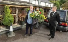  ??  ?? Cork Folk Festival chairman Jim Walsh, and original member since 1979 arrives to pay his respects at the Mills Inn, Ballyvourn­ey.