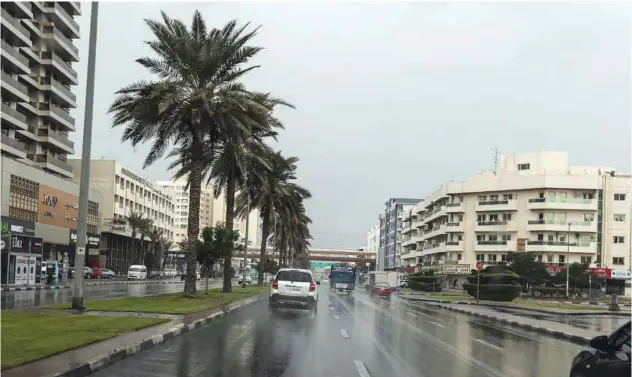  ?? Al Khaleej ?? ↑
A rain-soaked street in Dubai.