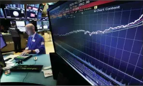  ?? AP/RICHARD DREW ?? The steady rise of the S&amp;P 500 index since 2009 is shown Wednesday on a screen on the floor of the New York Stock Exchange.