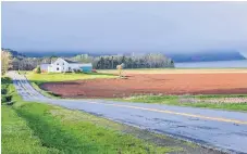  ??  ?? Near Blomidon, just as the rain clouds were clearing. (Cape Blomidon is lost in the fog)