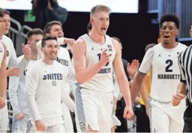  ?? MIKE DE SISTI/MILWAUKEE JOURNAL SENTINEL ?? The play of forward Sam Hauser has helped Marquette climb in national polls.