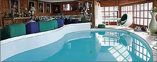  ??  ?? Getting In the swim: The chalet’s heated indoor pool has stunning views across the resort in the Swiss Alps