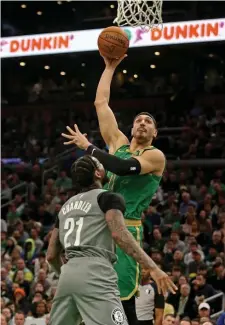  ?? StuArt CAHIll / HErAld stAFF FIlE ?? ‘WE NEED TO STAY HUMBLE’: Enes Kanter said the Celtics need to focus on themselves and staying healthy while in the bubble.