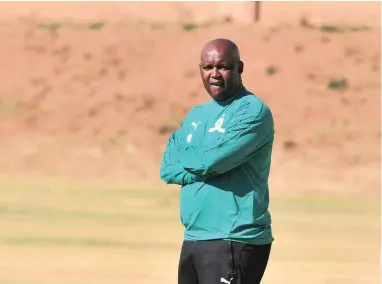  ??  ?? INTENSE: Mamelodi Sundowns coach Pitso Mosimane during a media day at Chloorkop this week.